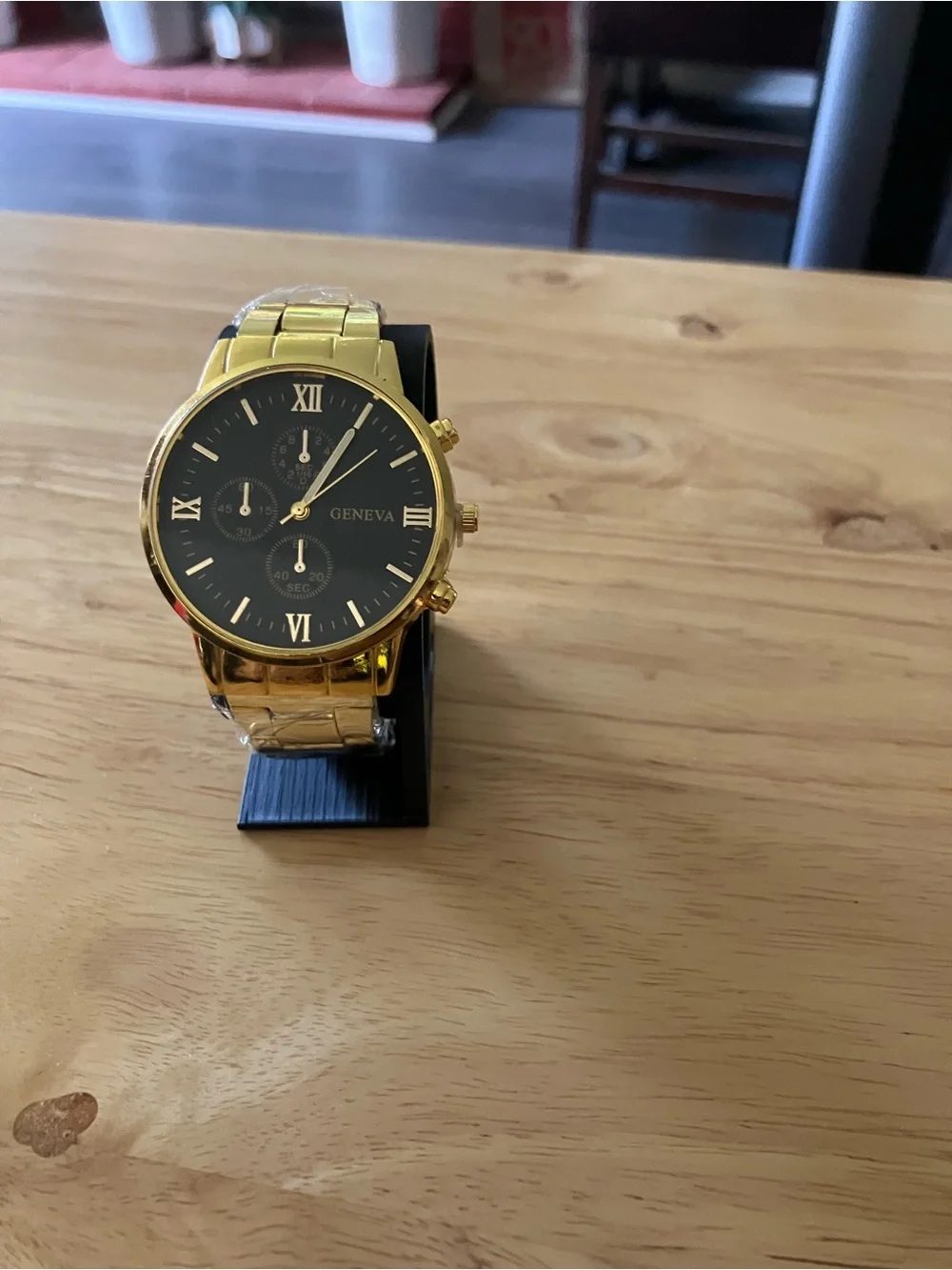 Geneva Gold Tone Watch with Black Dial